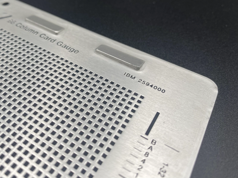 Detail of the card gauge showing the model number 'IBM 2594000'.