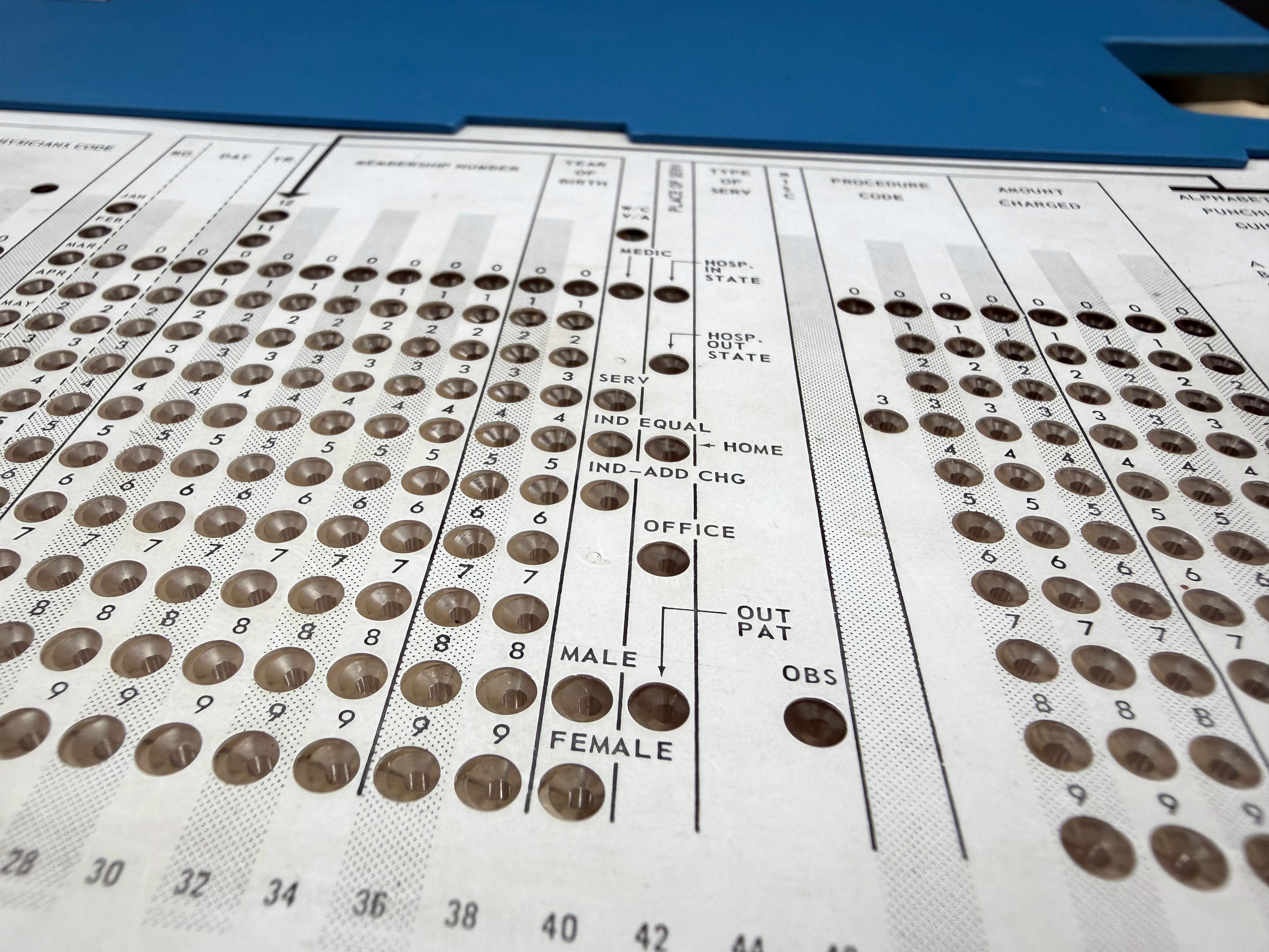 Additional detail of the punching area and the punching template overlay showing labels for specific punch positions.