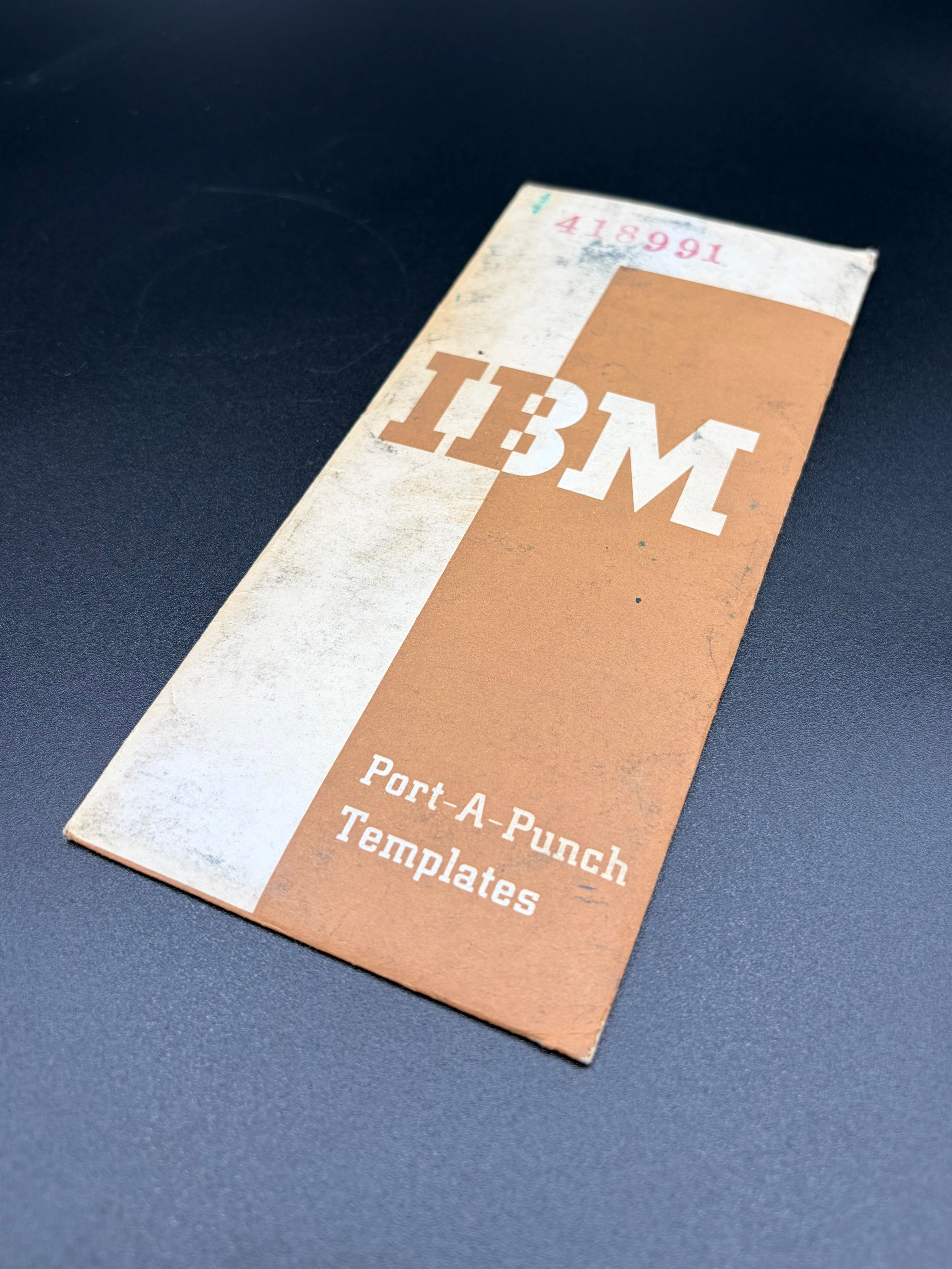 The Port-a-Punch template envelope closed.